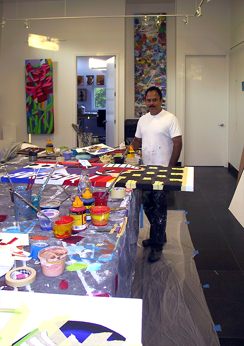 Artist Hector Vega working at his Kirtland studio