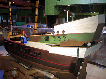 spanish-galleon-reconstruction,-by-john-rivera-resto,-2012,-painting-the-stern-of-the-ship