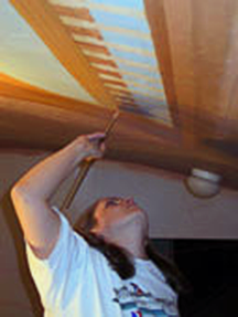 applying a base coat to the ballusters