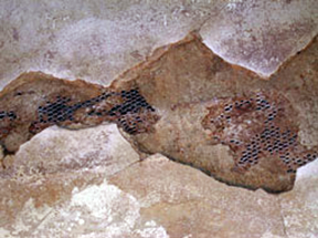 broken plaster and rusted latice