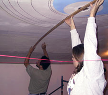 drawing the design by using the guidelines as reference points.