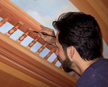 applying glazes to the balusters