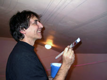 James Levin had the honor of the first brushstroke