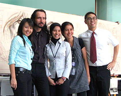 john rivera-resto posing with students at BINUS University